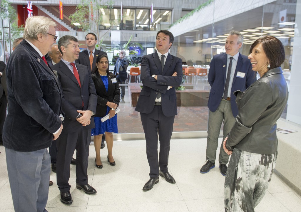 Italian Prime Minister Matteo Renzi (center) tours the Remote Operations Center West at Fermilab and learns about neutrinos. Photo: Fermilab