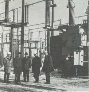 Standing near Master Substation are, from left, Aris Tsaparas, DUSAF; Robert Wilson; Bill Malm, United Power; E. Parke Rohrer and Bill Power, DUSAF.