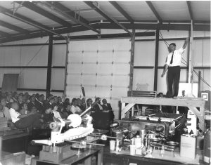 By all accounts, Fermilab founding director Robert Wilson was a charismatic individual. Here he's seen leading the first NAL Meeting at Lab 3 in the Village. Photo: Fermilab