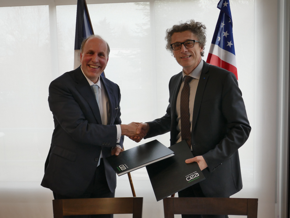 DOE Undersecretary for Science Paul Dabbar (left) and Vincent Berger, Director of Fundamental Research at the CEA, at the signing ceremony in France on Dec. 11. The signing with CNRS took place on Dec. 19.
