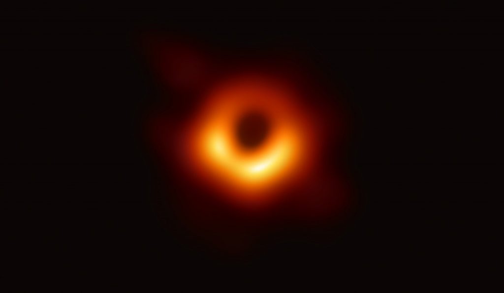 This is the first image ever taken of a black hole. This black hole resides at the center of Messier 87, a massive galaxy in the nearby Virgo galaxy cluster. Image: Event Horizon Telescope