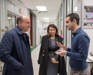 Under Secretary Paul Dabbar (left) receives an update on the development of better superconducting materials from Sam Posen and Anna Grassellino.