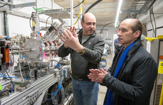 Scientist Lionel Prost briefs Menezes describes research at the Cryomodule Test Facility and at PIP-II. Photo: Reidar Hahn