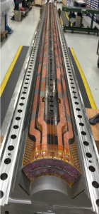 This completed niobium-tin magnet coil will generate a maximum magnetic field of 12 tesla, roughly 50 percent more than the niobium-titanium magnets currently in the LHC. Photo: Alfred Nobrega