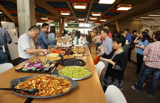 The Asian and Pacific American community at Fermilab gathers to eat and talk at the group's first meet-and-greet. Photo: Alex Chen