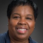 Professional portrait of Sandra Charles, Fermilab's chief equity, diversity, inclusion and accessibility officer