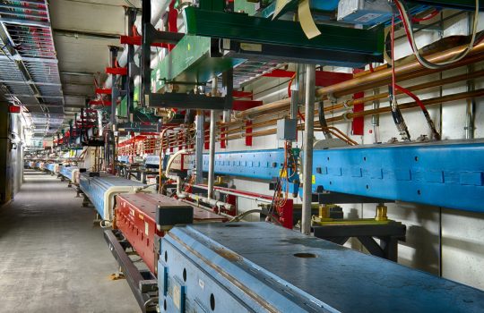 Engineers and scientists at Fermilab are designing machine learning programs for the lab’s accelerator complex. These algorithms will enable the laboratory to save energy, give accelerator operators better guidance on maintenance and system performance, and better inform the research timelines of scientists who use the accelerators. The pilot system will used on the Main Injector and Recycler, pictured here. It will eventually be extended to the entire accelerator chain. Photo: Reidar Hahn, Fermilab