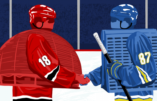 Two hockey players that resemble rock-em-sock-em robot toys shake hands on a rink. The one on the left is red and has a dome for a torso with the number 18 on the sleeve. On the right, the player is blue, with Fermilab's Wilson Hall as the torso and 87 on the sleeve. It holds a hockey stick.