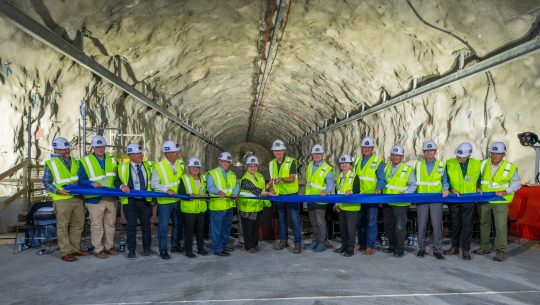 A ribbon-cutting event is held inside a cavern at Sanford Underground Research Facility in Lead, S.D. on Thursday, August 15, 2024.
