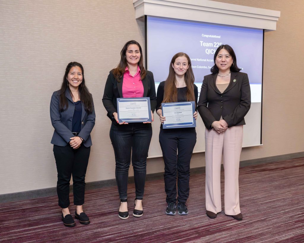 Fermilab participants in Energy I-CORPS receive certificates of completion for their project promoting the commercialization of the Fermilab-developed Quantum Instrumentation Control Kit, also known as QICK. Pictured, left to right, are Carolina Villacis, commercialization program manager for the U.S. DOE Office of Technology Transitions; Daiane Possebon Colombo, project entrepreneurial lead; Sara Sussman, project principal investigator; and Vanessa Chan, chief commercialization officer for the U.S. DOE and director of the OTT. Photo: Energy I-Corps