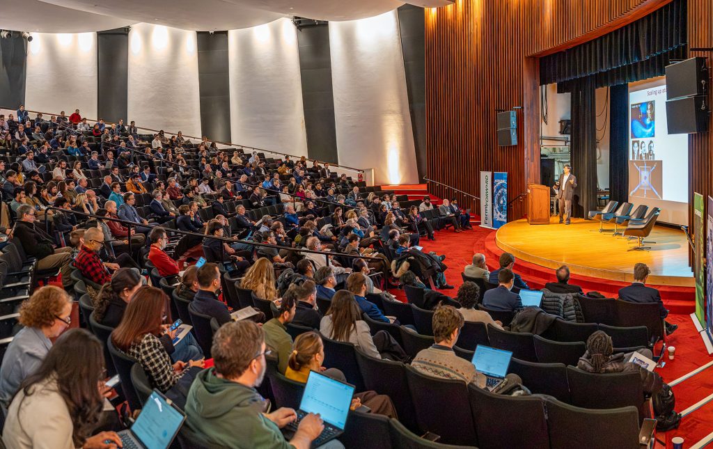 Jun Ye, professor at University of Colorado Boulder, delivers the symposium's keynote talk in Ramsey Auditorium on Thursday, Dec. 4. The subject of the talk was scaling up quantum systems for clock and fundamental physics. Credit: JJ Starr, Fermilab