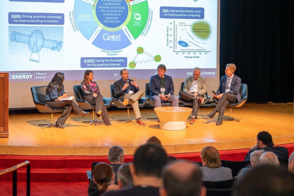 Associate director of Basic Energy Science for the Department of Energy Bindu Nair, left, leads a panel discussion with directors of the five DOE National Quantum Information Science Research Centers participate in a panel discussion in Ramsey Auditorium at Fermilab on Thursday, Dec. 4. Left to right are: Anna Grassellino of the Superconducting Quantum Materials and Systems Center, Martin Holt of the Q-NEXT Center, Travis Humble of the Quantum Science Center, Bert De Jong of the Quantum Systems Accelerator Center, and Charles Black of the Co-design for Quantum Advantage Center.
