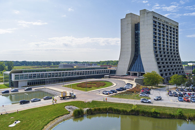 Wilson Hall, right, and the Helen Edwards Engineering Research Center, left, stand at the heart of Fermi National Accelerator Laboratory in Batavia, Ill. Credit: Ryan Postel, Fermilab