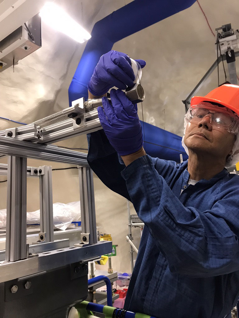 Hogan Nguyen works on the SuperCDMS experiment at SNOLAB. Credit: SuperCDMS collaboration