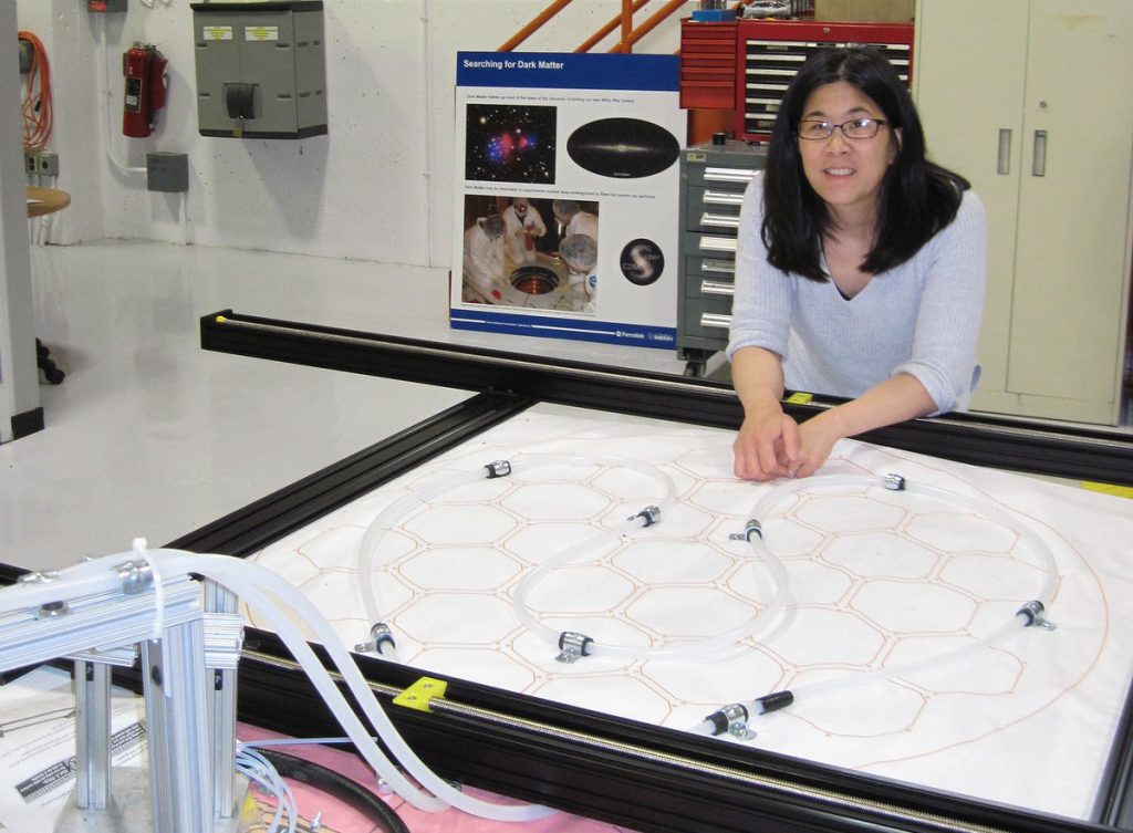 Caption: Lauren Hsu working on the SuperCDMS calibration system, when it was still at Fermilab in 2018. Credit: Lauren Hsu