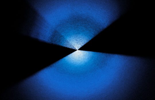 Two fans of blue and white dots extending up and down from center on a black background.