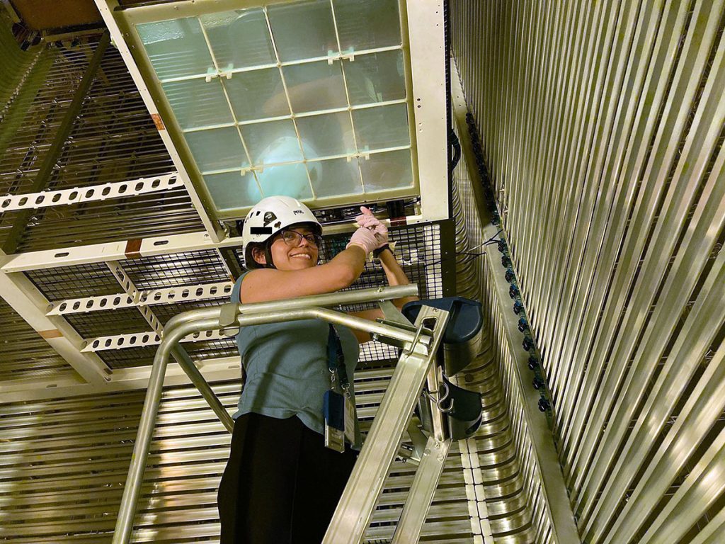 Diana Leon, a graduate student at South Dakota School of Mines and Technology, works on ProtoDUNE at CERN. Credit: Dante Totani