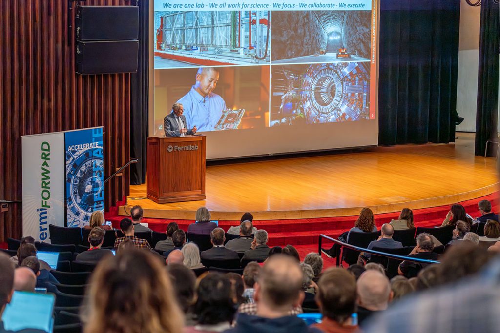 Fermilab Director Norbert Holtkamp leads an all-hands meeting in Ramsey Auditorium at Fermilab's iconic Wilson Hall earlier this year. Credit: JJ Starr, Fermilab
