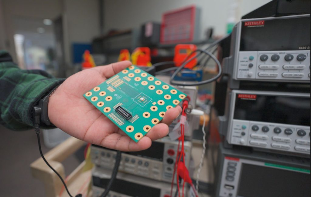 Custom circuit board designed to measure chip performance in cryogenic environments. Credit: JJ Starr, Fermilab
