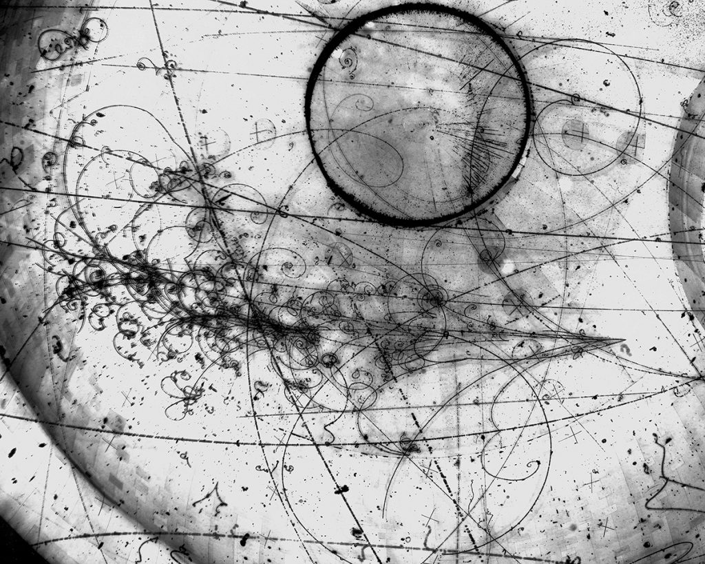 Picture of neutrino interaction in the Fermilab 15-foot Bubble Chamber with heavy neonhydrogen liquid mixture taken in April, 1976. Credit: Fermilab