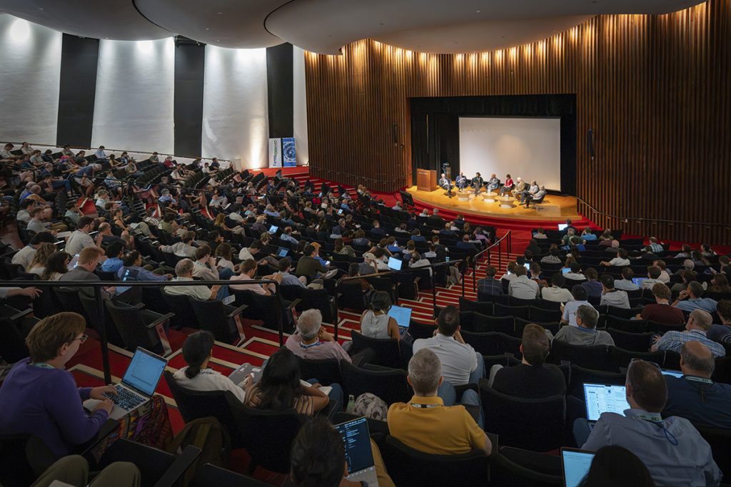 2026 DPF participants fill Ramsey Auditorium at Fermilab for a panel discussion. Credit: JJ Starr, Fermilab