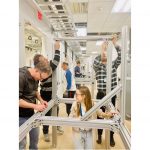 February 14, 2023: The fridges are coming! The day prior to the delivery of the new fridges, everyone from scientists, to engineers, to techs busy getting the lab ready. Photo credit: Anna Grassellino.