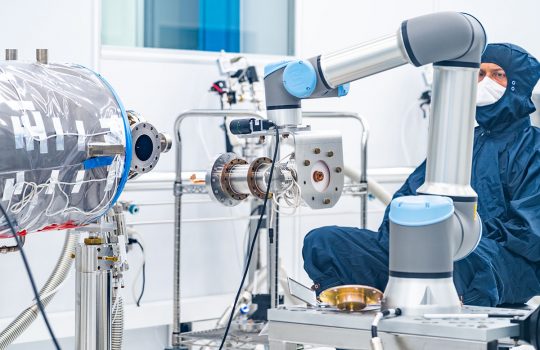 This summer, the PIP-II team reached an important milestone: a cobot autonomously aligned a coupler on an SRF cavity in a clean room. Credit: Ryan Postel and JJ Starr